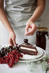 Chocolate cake with cherries and currants