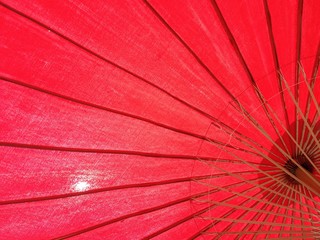 Full frame of  red big umbrella as background