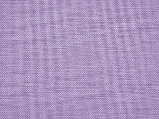 Fototapeta premium Woven surface close-up. Background or wallpaper from fabric. Reduced contrast. Toned in light purple