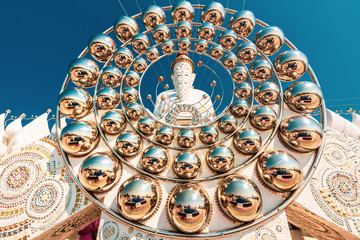 Amazing Thailand Temple with big Buddha statue on background scenery nature landscape at sunrise. Beautiful Landmark of Asia, Asian culture and religion.