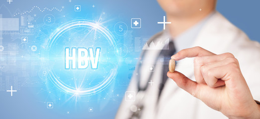 Close-up of a doctor giving you a pill with HBV abbreviation, virology concept