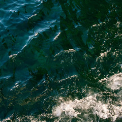 dark surface of sea water and waves.