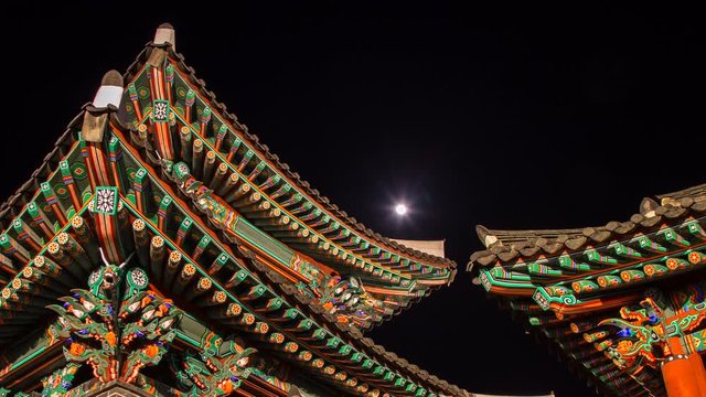 timelapse of night view with building and roof in gyeongbokgung palace (royal palace) 