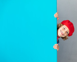 Artist child holding banner blank