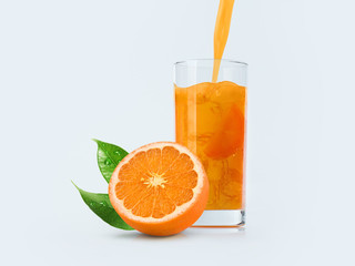 Orange and orange juice costs on a table on a light blue background.  Glass with orange juice