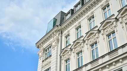 Obraz premium Beautiful facade, restored building exterior in old town.