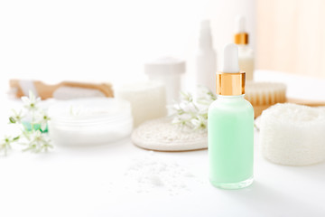 Fototapeta na wymiar Herbal dermatology cosmetic skincare product in glass jar on white background