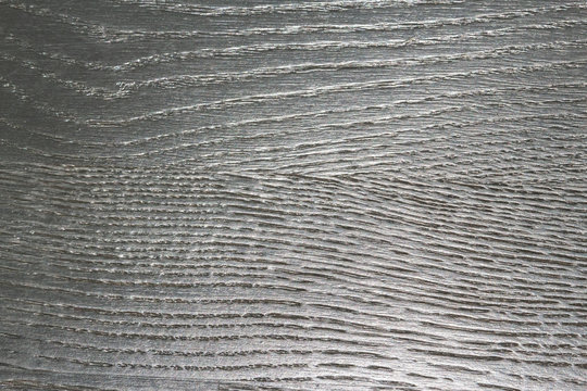 background of gray painted wooden planks with veins in evidence