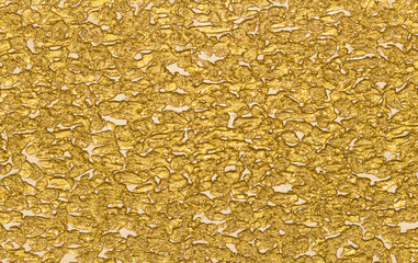 textured background of gold color