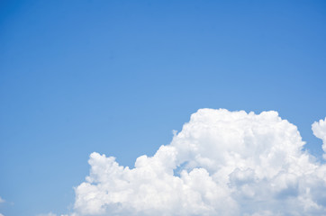 White clouds with blue sky background.