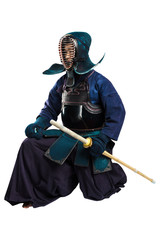 Portrait of man kendo fighter with shinai (bamboo sword). Shot in studio. Isolated with clipping path on white background