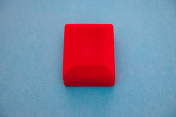 red velvet box on a blue background