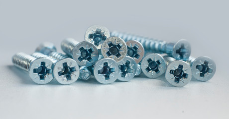 Furniture tie bolts on a white background