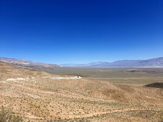 landscape with mountains and blue sky  in death valley california