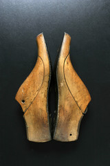 A pair of facing wooden shoe lasts