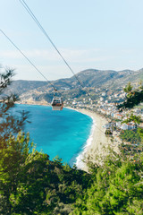 Cable car over Cleopatra beach in Alanya, Turkey. The cable car ride (funicular) to the top of the castle Alanya
