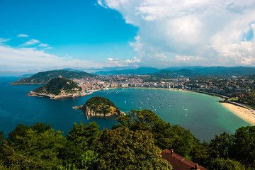 Fototapeta premium Views of La Concha Bay and Santa Clara Island in Donostia San Sebastian