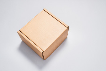 Brown cardboard box, mock up, isolated, on grey background