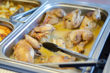 Mediterranean cuisine a pan placed for slow cooking chicken