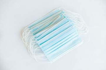 coronavirus COVID-19 pandemic. antiviral medical mask for protection against corona virus. Surgical protective mask. Medical respiratory bandage face on white background. quarantine, stay at home