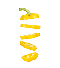 Pieces of chopped yellow sweet pepper flying in space on a white background isolate.