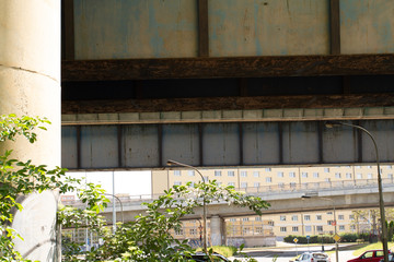 Fototapeta na wymiar old railway bridge for trains in the Czech city and tracks next to it