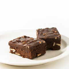 Fototapeta na wymiar Homemade chocolate brownies on a white plate.