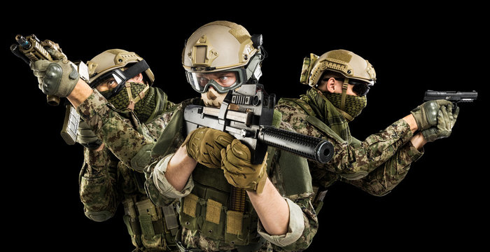 Male in uniform of Tactical Units of Police with submachine gun P90. Shot in studio. Isolated with clipping path on black background