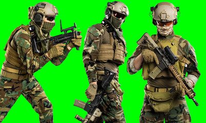 US marine corps soldier with rifle. Shot in studio. Isolated with clipping path on green chroma key background