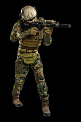 US marine corps soldier with rifle. Shot in studio. isolated with clipping on black background.