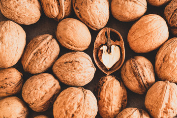 one peeled nut among whole ones