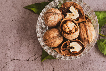 a plate of walnuts on the table