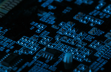 Computer microchips close-up. Digital technology. Blue light