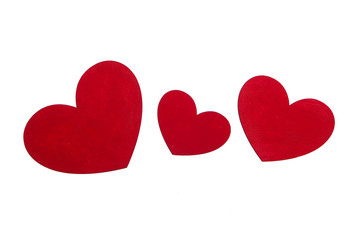 Red wooden hearts isolated on white background