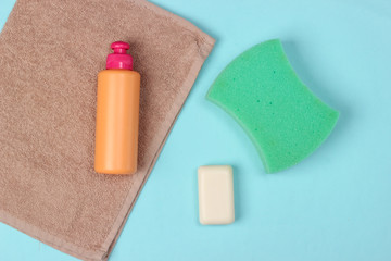 Beauty, health care, cosmetics, hygiene product on blue background. Flat lay. Top view