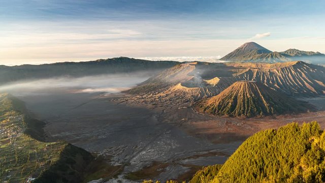 Sunrise at erupting Bromo volcano mountain, Tengger Semeru National Park, East Java, Indonesia ( zoom out)