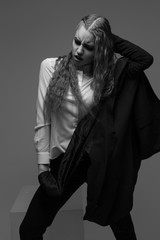 Fashion girl posing. Black and white photography.
