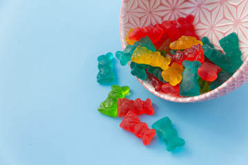 Summer time candy concept with colorful bunny gummy candy