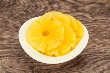 Marinated pineapple rings in the bowl
