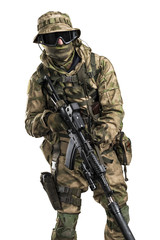Fototapeta premium Special forces soldier with rifle. Shot in studio. Isolated with clipping path on white background. 