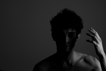 Black and white touching head curly hair teenager