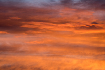 Sunset red sky with clouds horizontal background