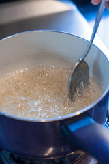 boiling sugar in a pan