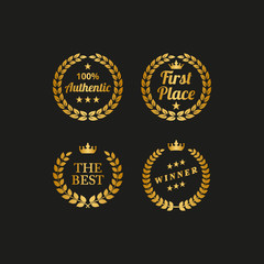 Naklejka premium Set of golden laurel wreaths on black background.