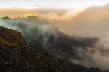 Fototapeta na wymiar Misty Clouds Moving Into Haleakala Crater,Haleakala National Park, Maui, Hawaii, USA