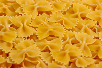 Italian pasta Farfalle. Pasta bows close up