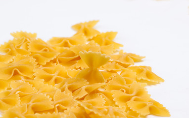 Italian pasta Farfalle. Pasta bows on white background