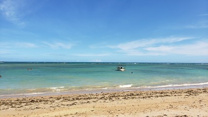 Fototapeta na wymiar tropical beach with a boat