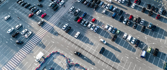 Cars on a market parking view from above
