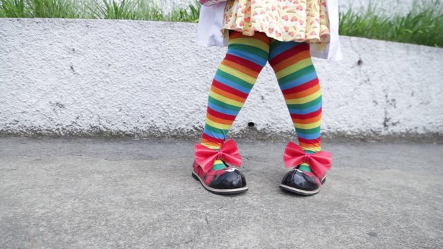 walking with clown shoes